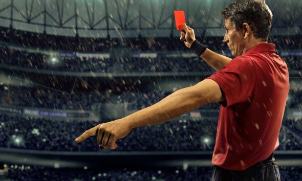 Soccer Referee Giving Red Card